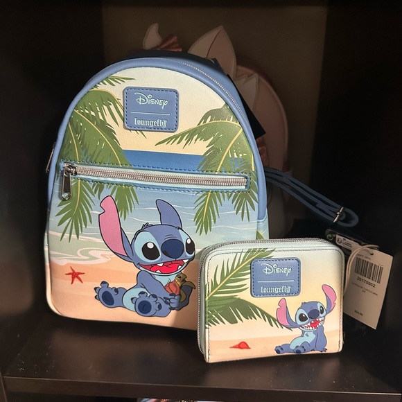 Loungefly Handbags - Stitch and turtle loungefly bag and wallet